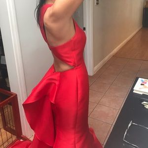 Red dress Jovani $200 Blue Dr Nicole Bhakti $200